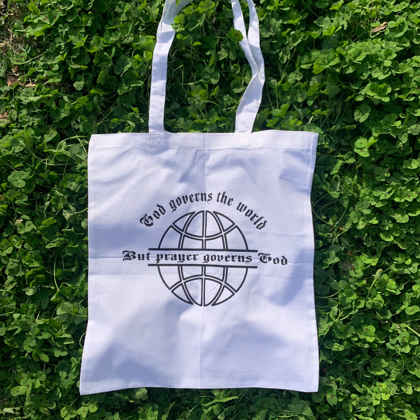 God governs the World Tote Bag